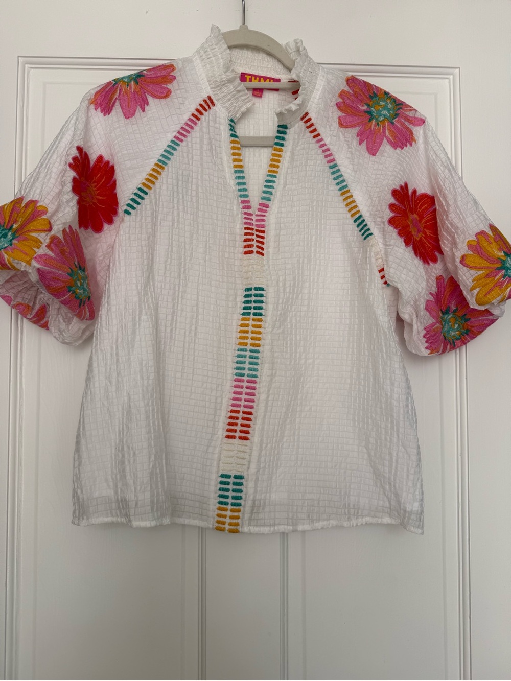 THML Symphony White Textured Blouse with Multicolor Embroidery